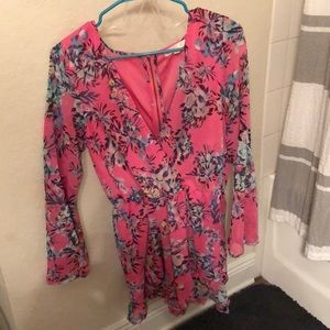 Hot Pink Romper with flowers. Bell sleeves.